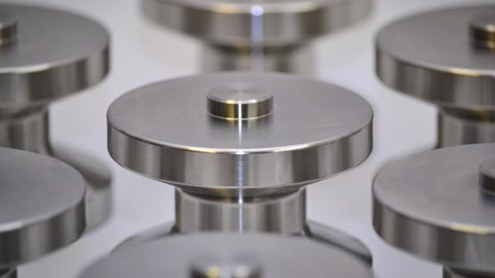 Batch produced metal components