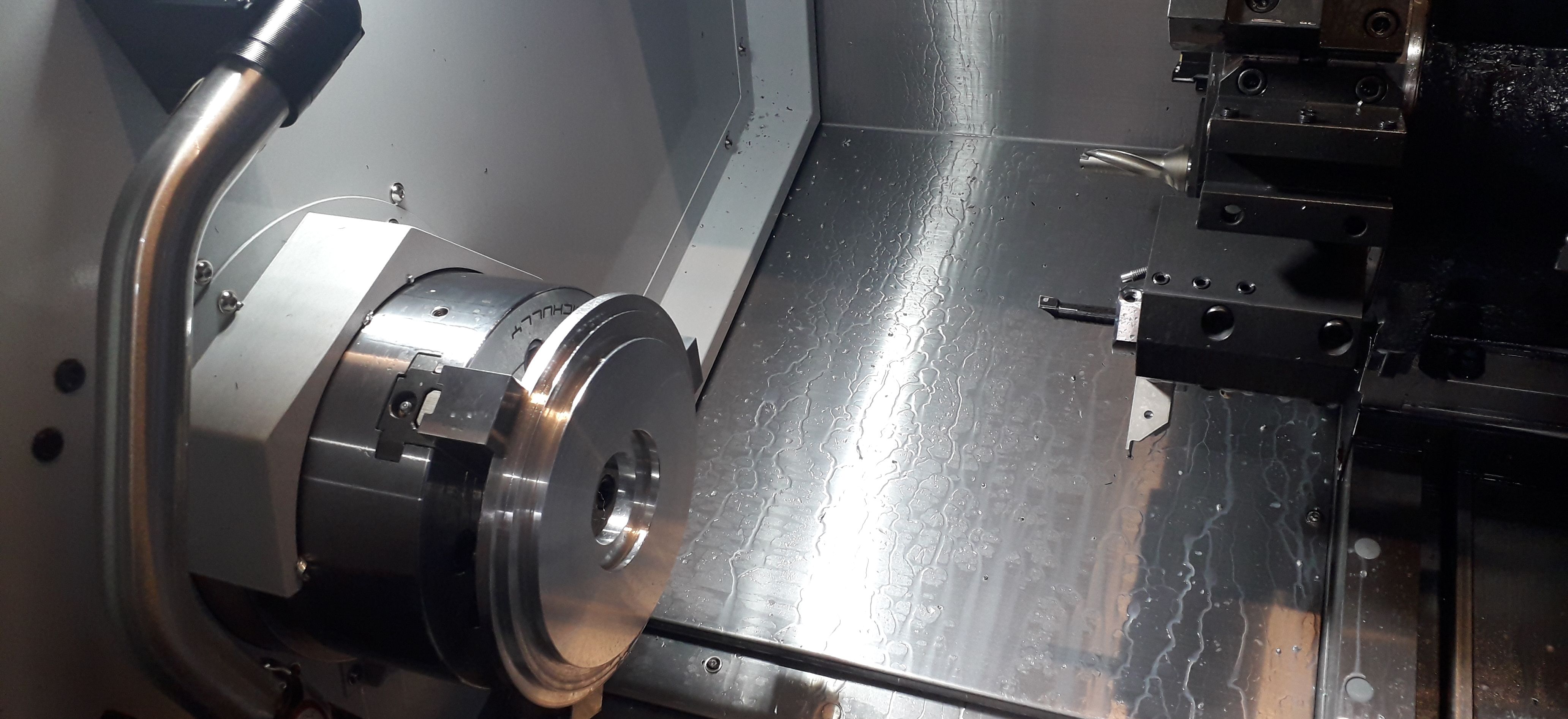 Doosan Puma GT2600M machining a Back Plate